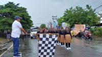 Peserta Yosim Pancar (Yospan) jalan di lepas langsung oleh Plt Sekretaris Daerah Kabupaten Biak Numfor Zacharias L. Mailoa, ST,. M.M