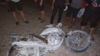 Kebakaran diduga disebabkan satu unit sepeda motor (Suzuki Thunder) terbakar pada saat hendak mengisi BBM