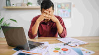 Man working in office and stress