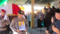 Kapolres Kotamobagu Pimpin Pemakaman Brigadir Indra Dotulong